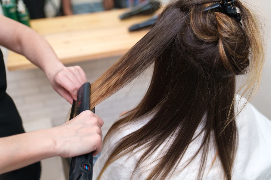 How a Silk Press Protects Natural Hair from Heat Damage in Buffalo NY